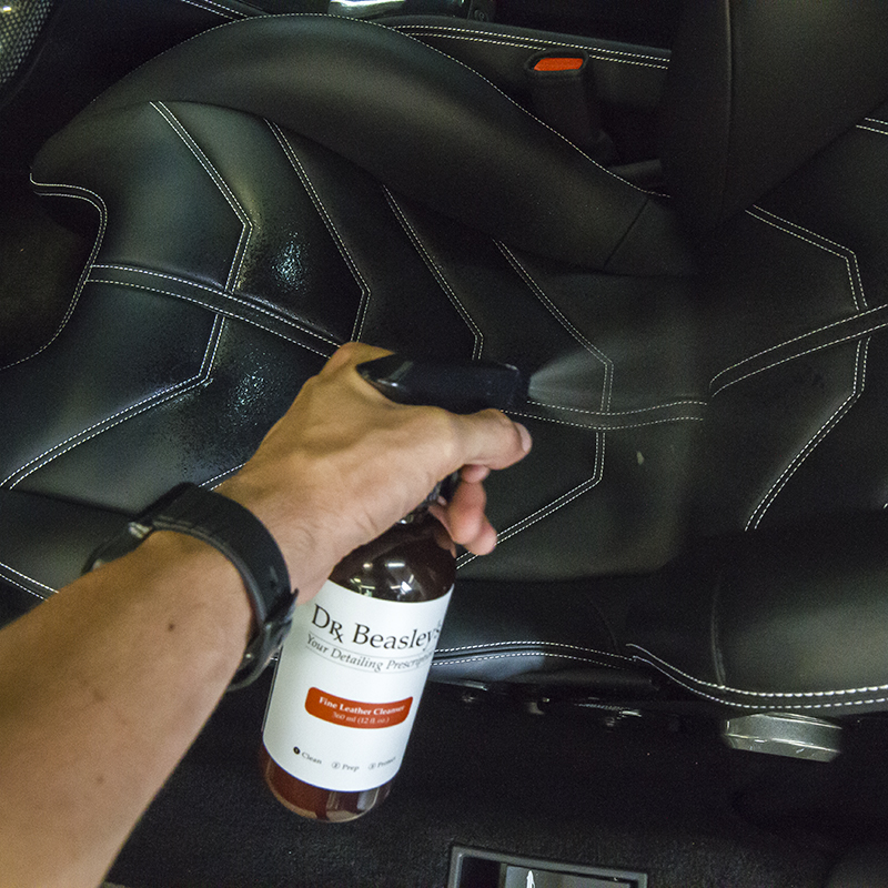 Fine-Leather-Cleanser-in-Ferrari-Spraying